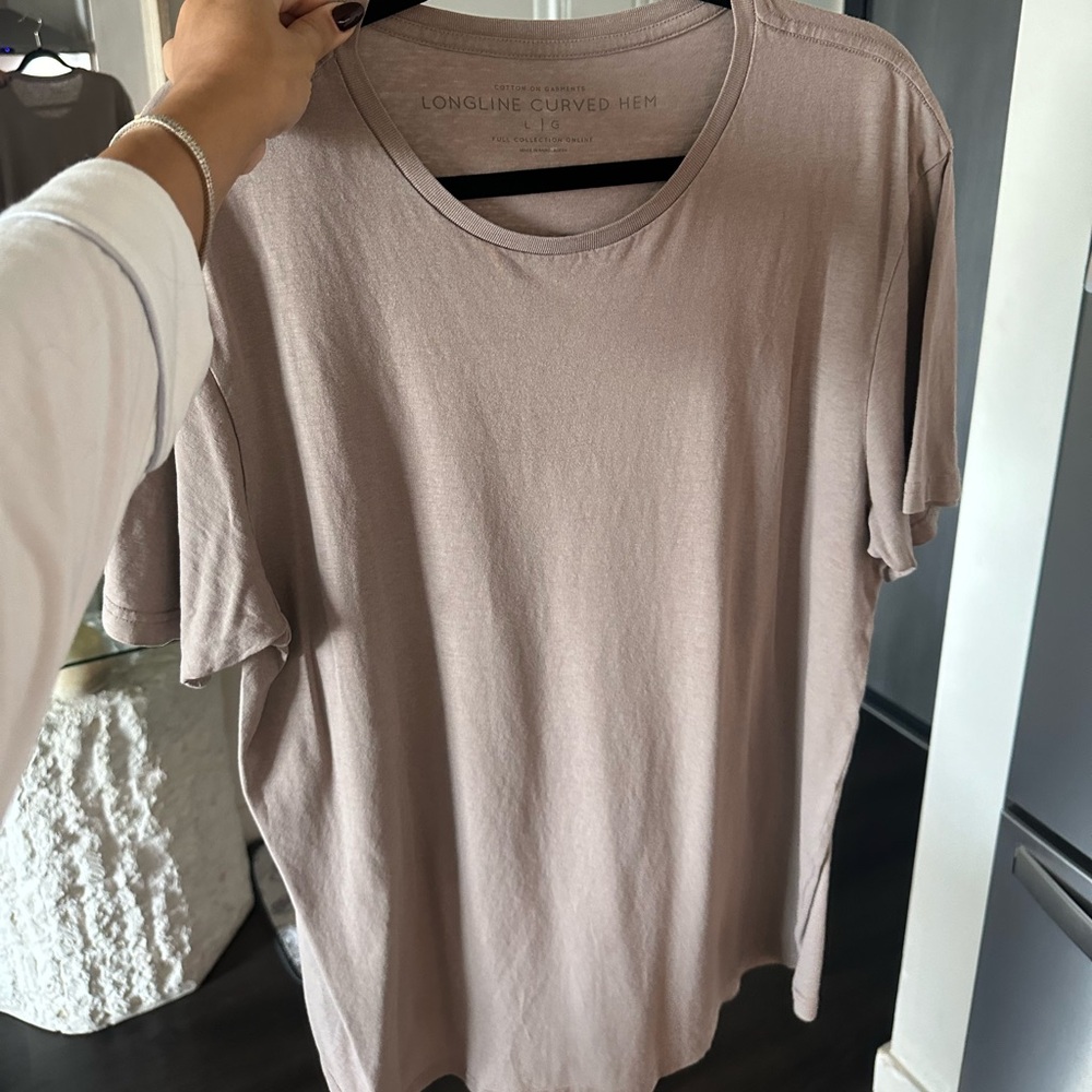 long curved shirt